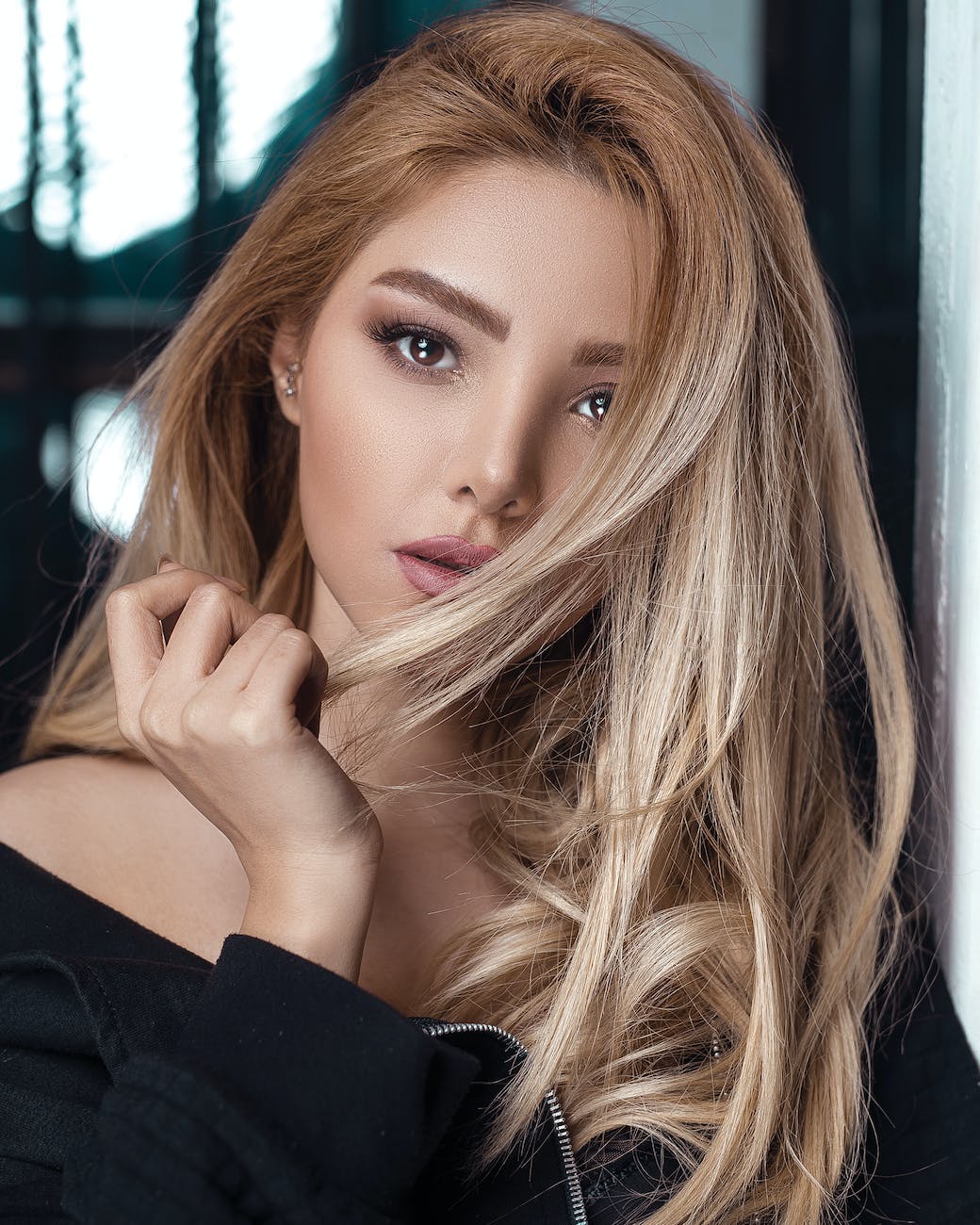 portrait photo of woman wearing black top
